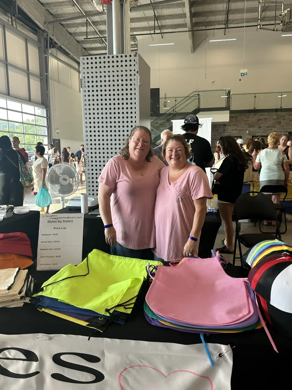 Tracey and Cindy in matching pink Styles by Sisterz shirts