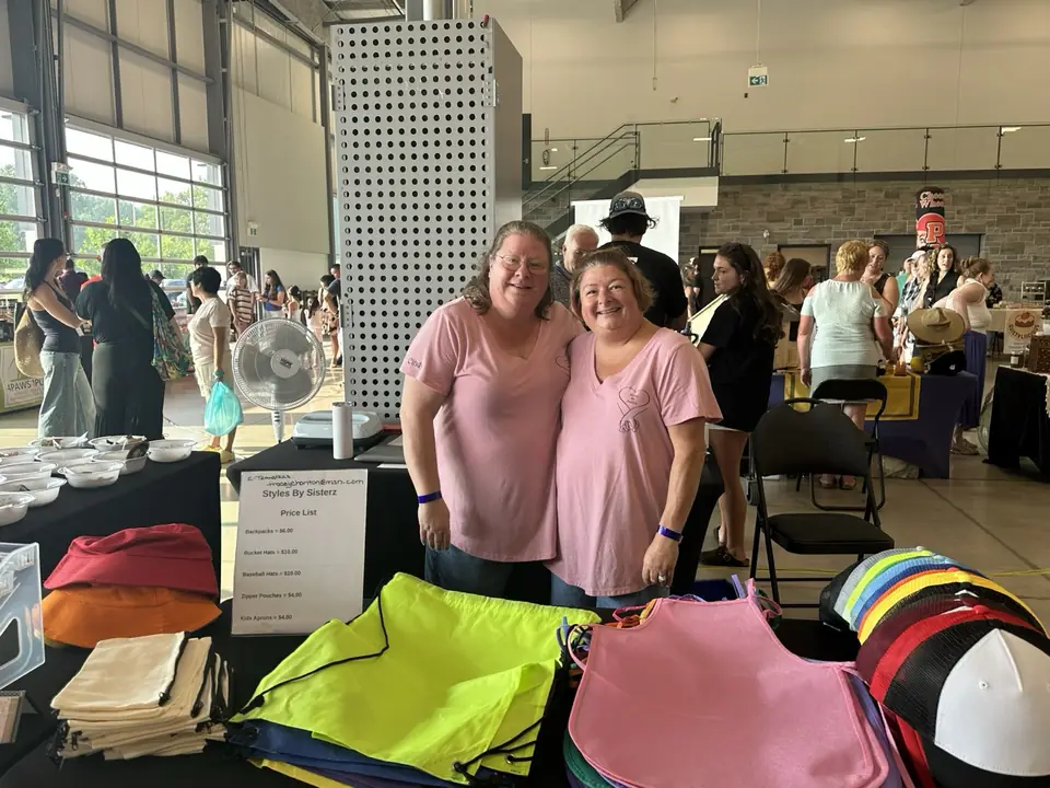 Tracey and Cindy, the sisters behind Styles by Sisterz, at their booth
