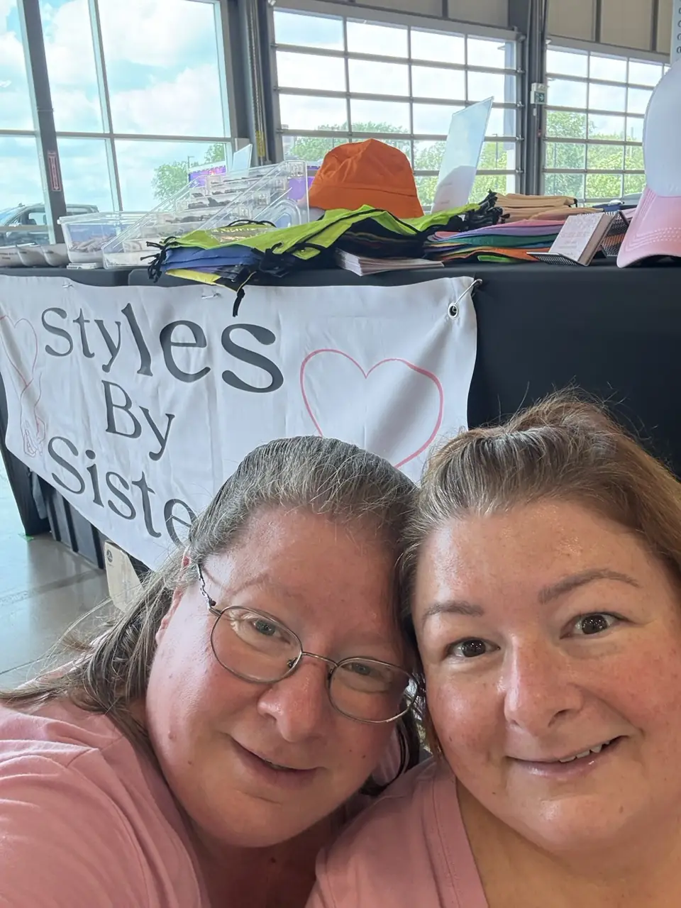 Selfie of the two sisters at their market booth