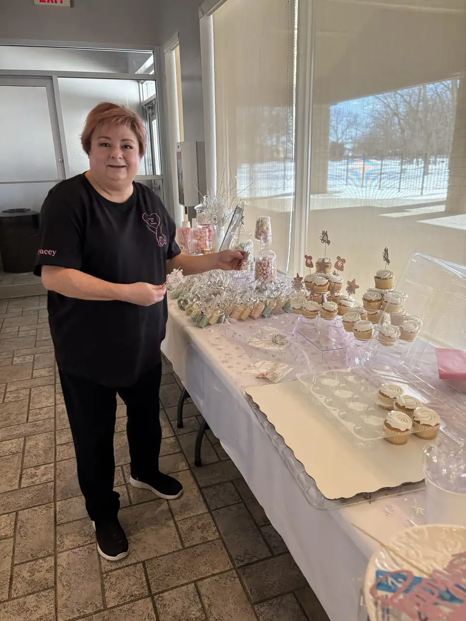 Tracey adding the finishing touches to a dessert table