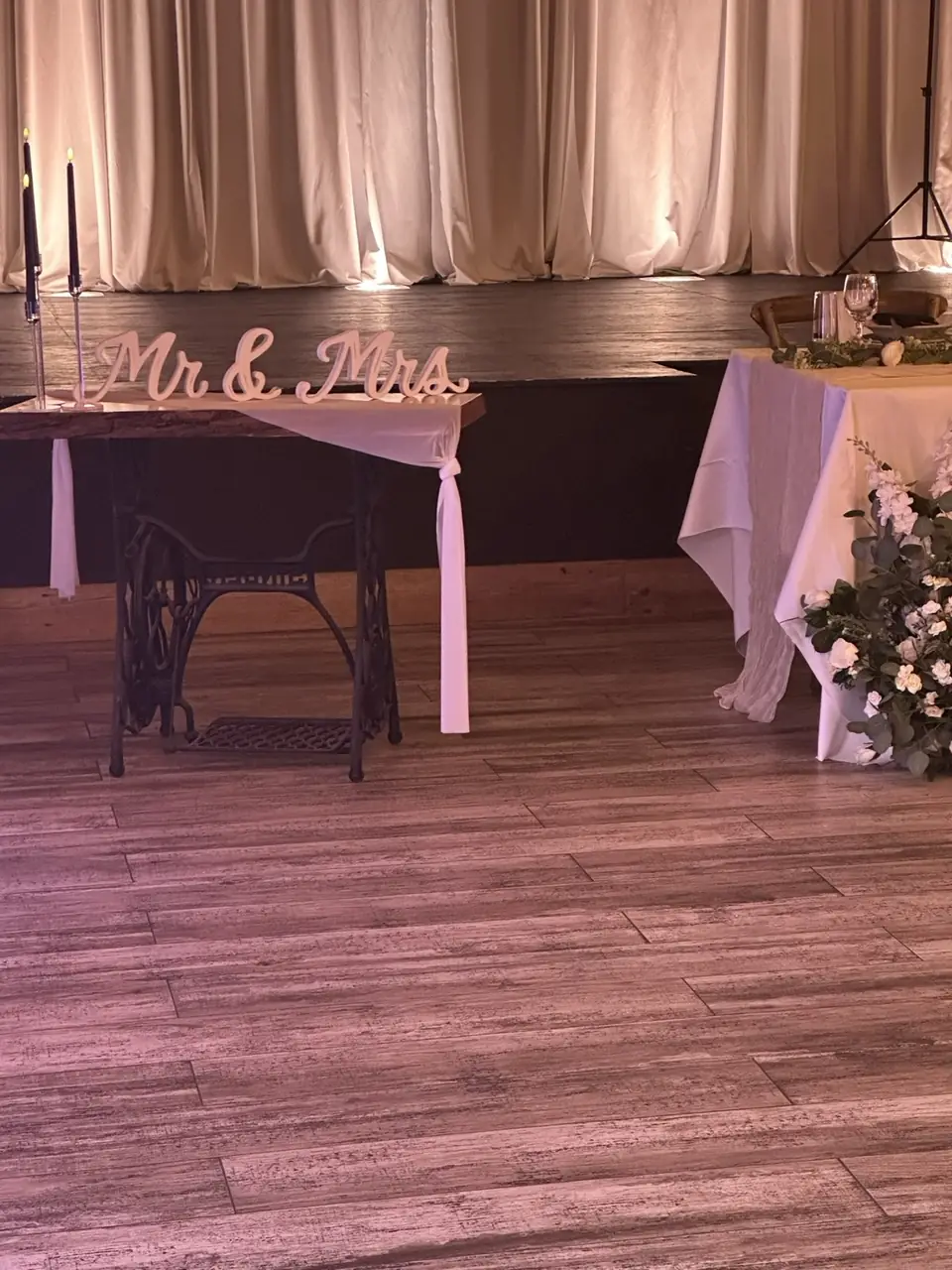 Mr & Mrs sign on a vintage sewing machine table
